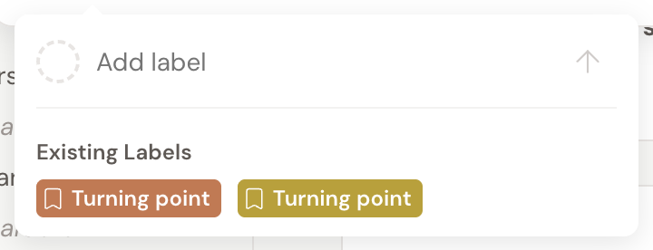 The label popover on a plot point, showing an Existing Labels heading with the project's labels listed beneath it as coloured badges you can click to apply.